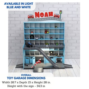 Toy car garage in light blue with light and inscription image 2