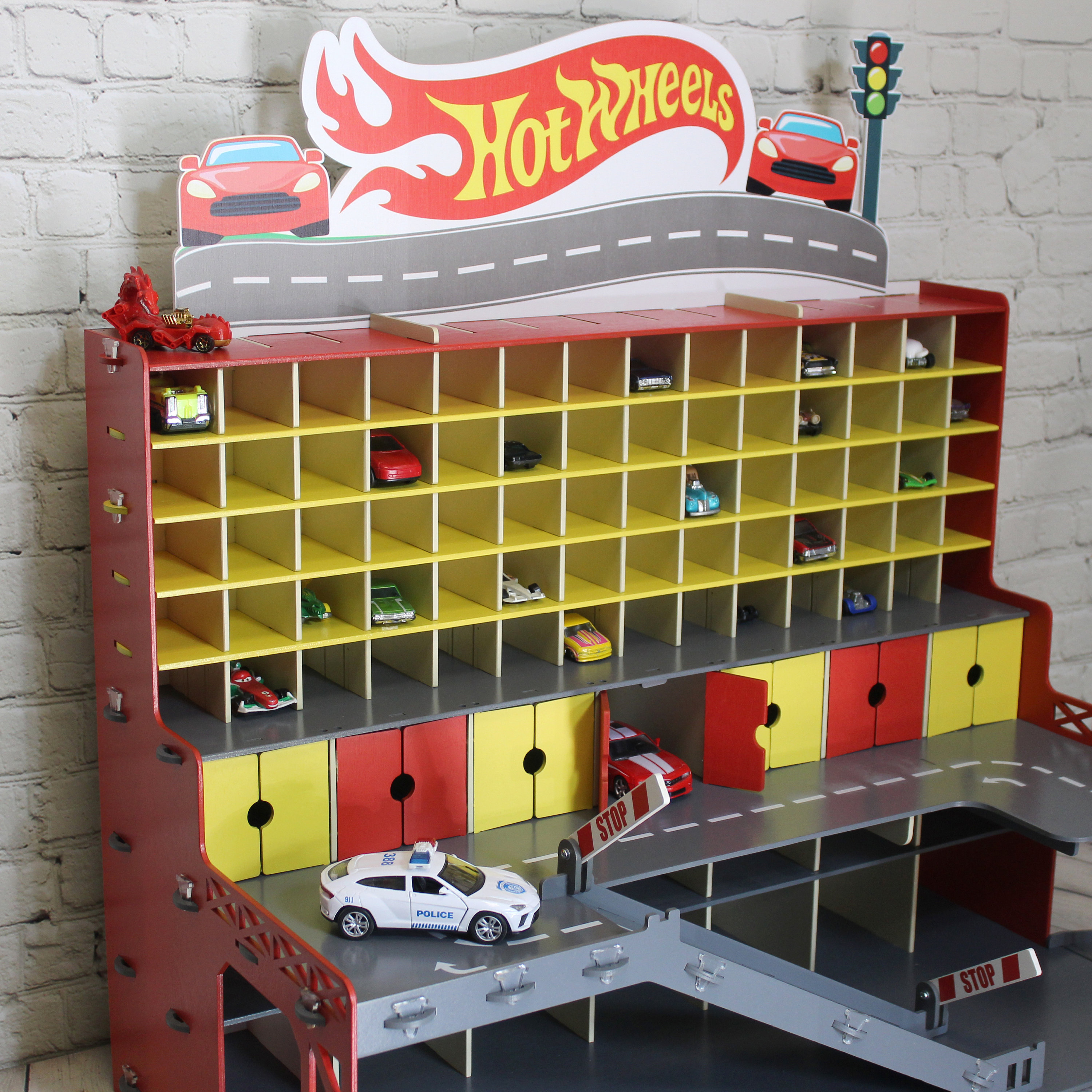 Hot Wheels display with additional larger cells for larger toy | Etsy