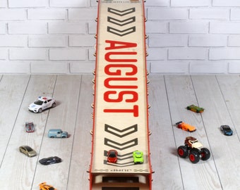 Personalized Toy Car Ramp with Jump Feature and Storage Cells