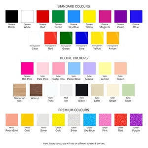 May include: A chart showing different color options for a product. The colors are organized into three categories: Standard Colors, Deluxe Colors, and Premium Colors. Each color is represented by a square with a text label describing the color name and finish.