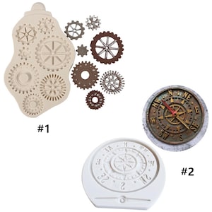 May include: Two silicone molds for baking. The first mold is shaped like a gear and has multiple gear shapes inside. The second mold is shaped like a compass with a compass rose inside. The molds are white and have the numbers #1 and #2 next to them.