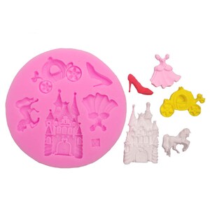 May include: Pink silicone mould with various princess-themed shapes, including a castle, carriage, glass slipper, and a dress. The mould is on a white background.