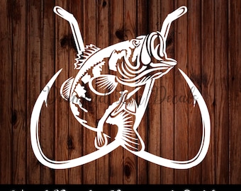 May include: White vinyl decal of a bass fish with two fishing hooks. The fish is jumping out of the water and the hooks are crossed behind it. The decal is on a wood background. Vinyl Decal - Permanent Outdoor