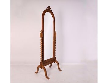 Solid teak a free standing Colonial mirror with jacobian details