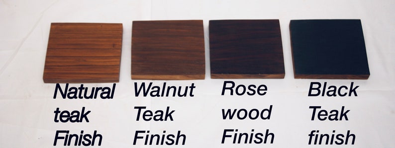 May include: Four wood samples showing different finishes: natural teak, walnut teak, rose wood, and black teak.