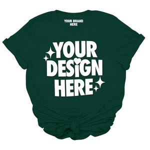 May include: A dark green t-shirt with the text "YOUR BRAND HERE" and "YOUR DESIGN HERE" in white. The shirt has a relaxed fit and a knotted bottom.