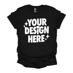 May include: Black t-shirt with the text "YOUR DESIGN HERE" in white with a small heart and stars.