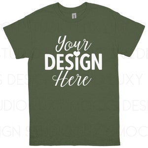 May include: Olive green t-shirt with the text "Your DESIGN Here" in white, a heart symbol is placed above the letter "I". The t-shirt is a crew neck style.