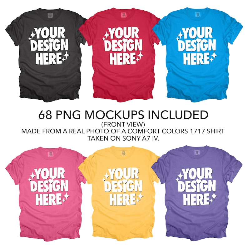 May include: Six different color t-shirts with the text "YOUR DESIGN HERE" printed on the front. The t-shirts are laid flat on a white background.