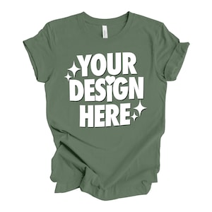 May include: A green t-shirt with the text "YOUR DESIGN HERE" in white. The text is surrounded by small white stars.
