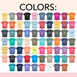 May include: A chart of 64 different colored t-shirts. The colors are arranged in rows and columns. The colors include: Banana, Black, Blossom, Blue Jeans, Blue Spruce, Boysenberry, Brick, Bright Orange, Butter, Charcoal, Chambray, Chili, Cobra Blue, Coral, Cypress, Denim, Emerald, Espresso, Flu Blue, Granite, Grape, Graphite, Grey, Hemp, Hydrangea, Ice Blue, Island Green, Island Mist, Ivory, Jade, Lemon, Light Green, Midnight, Mustard, Navy, Neon Lemon, Neon Pink, Neon Red, Ochre, Paprika, Peachy, Pepper, Periwinkle, Red, Royal Blue, Sage, Sandstone, Sapphire, Seafoam, Terracotta, Teal Blue, True Navy, Violet, Watermelon, White, Wine, and Tan.