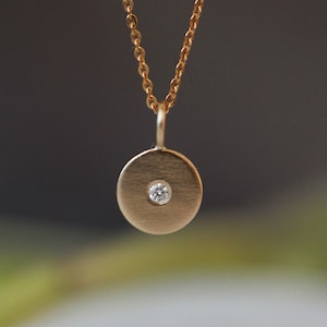 9ct Diamond disc pendant 9ct Diamond disc pendant