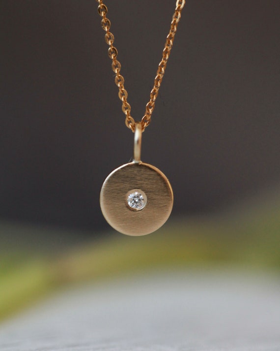 9ct Diamond disc pendant 9ct Diamond disc pendant