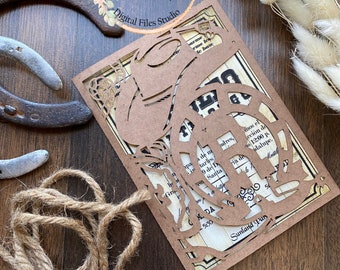 May include: A brown paper cut-out invitation with a western theme. The invitation features a cowboy hat, a horseshoe, and a lasso. The text on the invitation reads "Sunland Par" and "5:30".