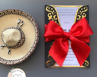 May include: A black and gold invitation with a red bow. The invitation has a gold design and the text "feré historias para contarte, in is palabras para decirte en no te quiero como a nadie" in Spanish. The text "Nosotros: na y" is also visible.