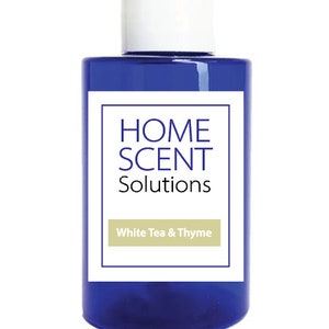 May include: A blue bottle with a white cap and a white label that says "HOME SCENT Solutions" and "White Tea & Thyme".
