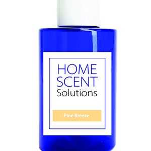 May include: A blue bottle with a white cap and a label that says "HOME SCENT Solutions" and "Pine Breeze".