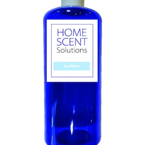 May include: A blue plastic bottle with a white label that says "HOME SCENT Solutions" and "Sea Water".