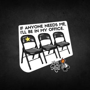 May include: A white sticker with the text "If anyone needs me, I'll be in my office."  Three black folding chairs are shown with a yellow star on the back of the middle chair. The sticker has the text "Riot & Roll" with a stylized image of a lit torch.