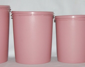Juego de cuatro botes Tupperware Servalier lisos de color rosa malva de estilo vintage