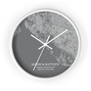 May include: A gray and white circular wall clock with a map of Southsea, Portsmouth, UK. The clock hands are pointing to 3:00 PM. The text "SOPHIE & MATTHEW" is printed below the map, along with the date "14. Jan. 2018".