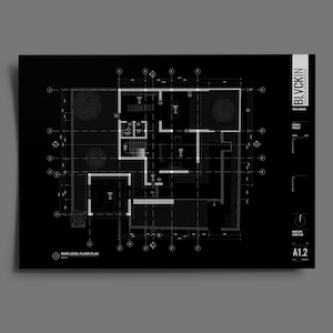 May include: Black and white architectural floor plan of a house with a main level floor plan labeled A1.2. The plan shows a living room, kitchen, bedrooms, and bathrooms.