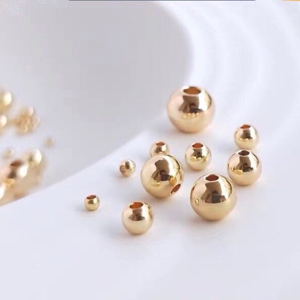 Perles en laiton rondes lisses plaquées or véritable 14K de haute qualité