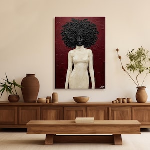 May include: An abstract painting of a person with a large, textured black afro and a white turtleneck dress against a deep red background. The artwork is displayed above a wooden cabinet with decorative items.