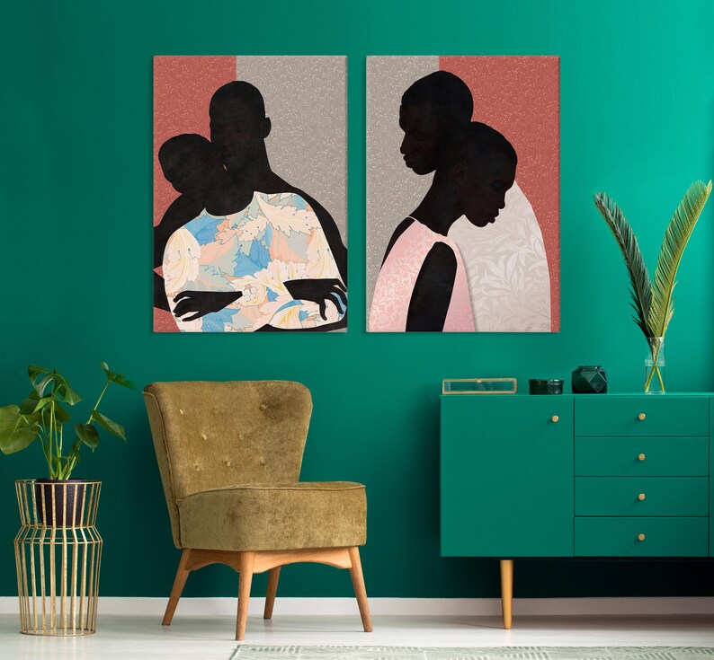 May include: Two rectangular wall art prints featuring stylised silhouettes of people against a textured coral and grey background. The left print shows figures in a blue and white patterned shirt, while the right print depicts figures in a pink garment.