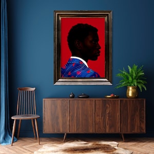 May include: A framed portrait of a person in profile against a red background. The person is wearing a blue jacket with red heart-shaped designs. The portrait is displayed on a dark wood cabinet with a plant in a gold pot.