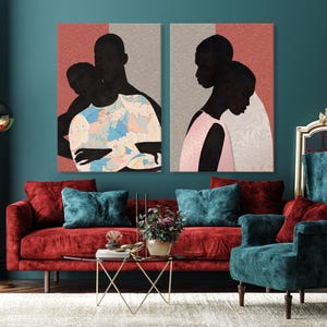 May include: Two rectangular wall art prints featuring stylised silhouettes of people. The left print shows two figures in a blue and white floral garment against a coral background. The right print depicts two figures in pink against a grey background.