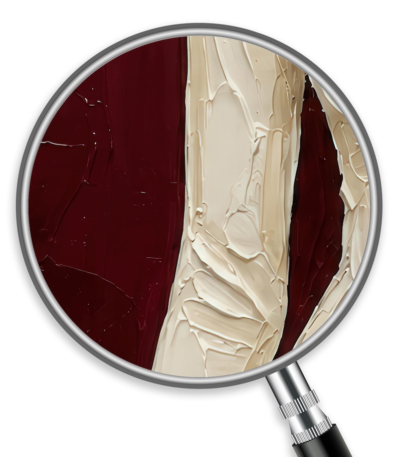 May include: Close-up of an abstract painting viewed through a magnifying glass. The artwork features thick brushstrokes of deep burgundy and creamy off-white, creating a textured, tactile appearance. The magnifying glass adds a sense of detail.