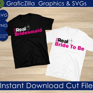 May include: Two t-shirts with a wedding theme. One black t-shirt says "the Real Bridesmaid" with a pink ring and sparkles. The other white t-shirt says "the Real Bride To Be" with a pink ring and sparkles.