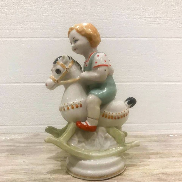 Porcelain figurine "Boy on a horse". Polonsky Porcelain Factory Ukraine, USSR period, 60-70s Series "Children, Happy Childhood".