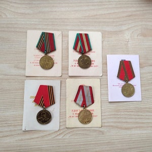 Original World War II awards from Ukraine with award documents for one person from the USSR period