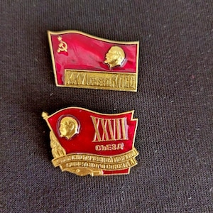 Pair of Vintage USSR Badges – 26th & 27th CPSU Congress with Lenin’s Profile on Red Flag