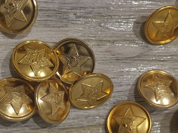 ソ連軍の軍服のボタン 24 個セット。ボタンには鎌とハンマーの付いた星