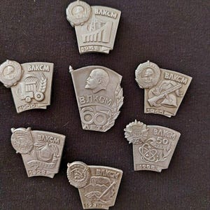 Vintage USSR Badge Set – 60 Years of VLKSM (7-Piece Commemorative Collection)