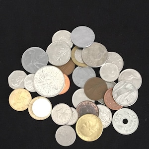 Global Treasury: 25 Diverse Coins from Around the World