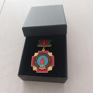 CHERNOBYL LIQUIDATOR Ukrainian Soviet medal Ukraine nuclear accident cross badge . Liquidator of Chernobyl nuclear accident