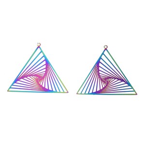 May include: Two iridescent triangle earrings. Each earring features a geometric design with a spiral pattern. The earrings have a loop at the top for hanging. The color shifts from blue to purple to green.
