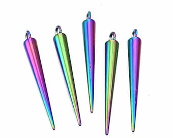 May include: Five iridescent cone-shaped pendants with a loop at the top for hanging. The pendants transition through a spectrum of colors, including pink, green, and purple. The pendants are displayed against a white background.