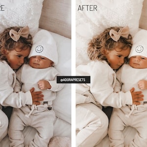 May include: Two children, one wearing a white beanie with a smiley face, are lying on a white fluffy blanket. The older child is wearing a beige sweater and pants, and the younger child is wearing a white sweater and pants. The older child has a brown bow in their hair. The image is captioned "@ADORAPRESETS".