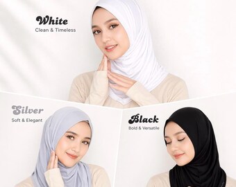 May include: A promotional image showcasing three Sport Hijab Jersey Style 2 headscarves in white, silver, and black. The white hijab is labeled "Clean & Timeless", the silver "Soft & Elegant", and the black "Bold & Versatile". The brand logo "adha LABELS" is at the top.