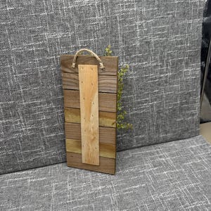 Rustic Wall Accent Farmhouse Style Design Wooden Slat Construction Gray Black White Color Scheme Decorative Burlap Bow Greenery Accent Piece Modern Country Aesthetic Handmade Wall Hanging Small Space Decoration Perfect Kitchen Display