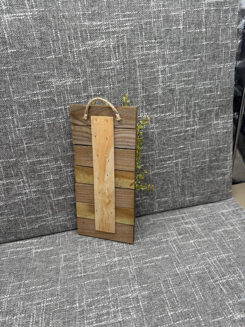 Rustic Wall Accent Farmhouse Style Design Wooden Slat Construction Gray Black White Color Scheme Decorative Burlap Bow Greenery Accent Piece Modern Country Aesthetic Handmade Wall Hanging Small Space Decoration Perfect Kitchen Display
