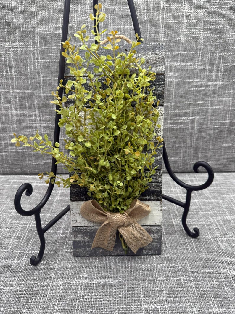 Handcrafted Wall Art Rustic Farmhouse Design Wooden Slat Construction Painted Gray Black White Finish Decorative Burlap Bow Faux Greenery Detail Modern Country Style Accent Small Wall Hanging Perfect Kitchen Display Living Room Decoration