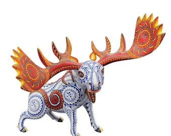May include: A hand-painted wooden moose figurine with intricate patterns. The moose features a white body with blue and red designs, and large red antlers with yellow and orange accents. The figurine is a decorative item.