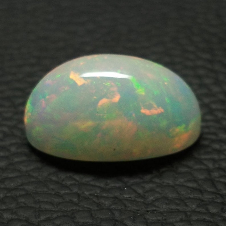 10.6 Cts Ethiopian Opal Cabochon Multi Fire Opal Natural Ethiopian loose Stone Welo Fire Opal Oval Shape Opal Cabochon 19x11x10 MM \u2013 AMI270