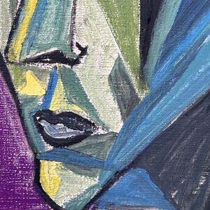 May include: Abstract painting of a face with blue, green, yellow, and black paint. The face is partially obscured by a blue and black shape.
